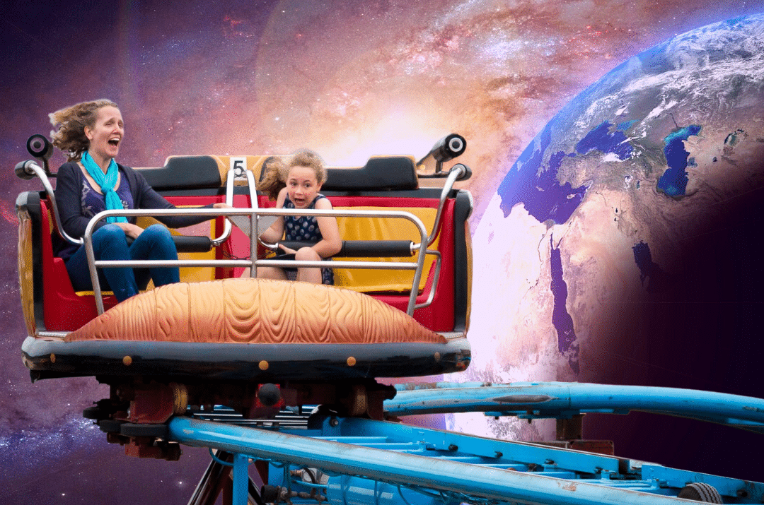 carnival-rollercoaster-ride-woman-and-child-sat-on-ride