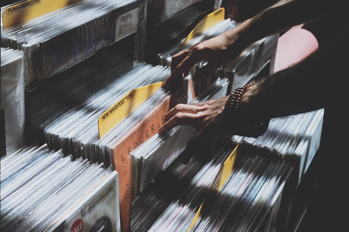 flicking through vinyls at the record store